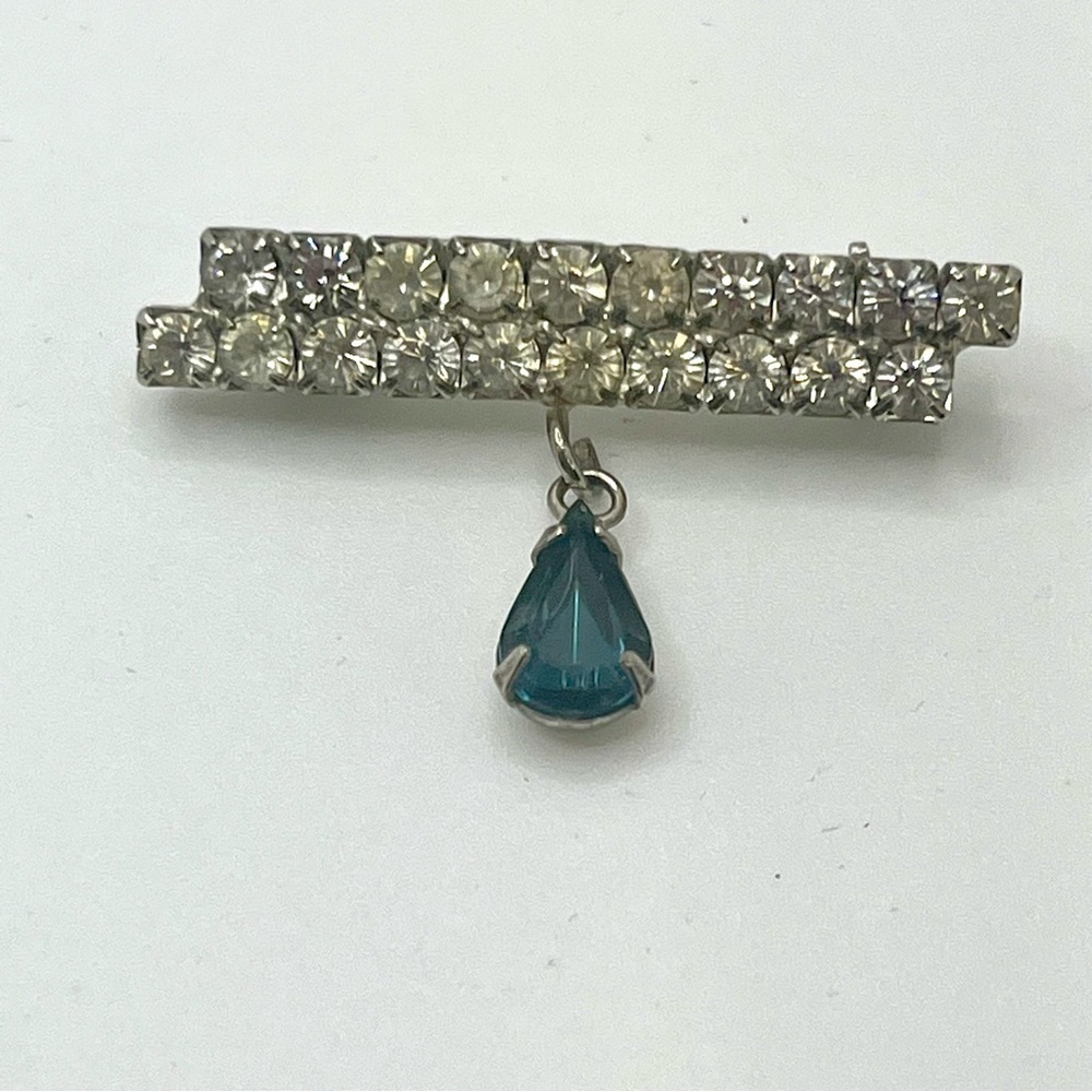 Vintage rhinestone bar brooch with blue glass teardrop dangle, silver-tone, MCM